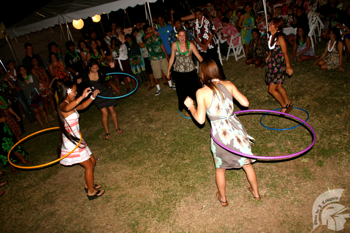 (L-R): Seniors Kylee Cornelio, Kaila Kikugawa, Elizabeth Gustafson, Kylie Taniguchi, and Crystal Kaiwi participated in a hula hoop competition, one of the many games played at Senior Luau.