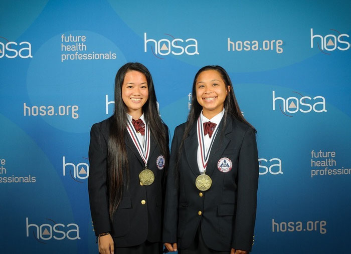 (L-R): Alumnae Melanie Pacpaco and Jacqueline Fry took gold in the Career Health Display category.