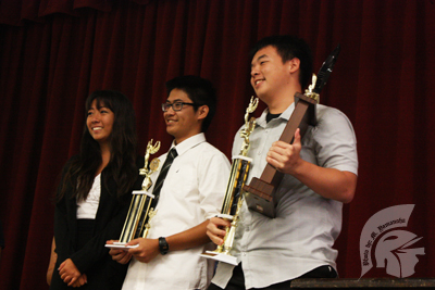 (L-R) Seniors Danielle Teurkina, Marc Siler, and Abraham Kwan were presented their trophies at the Award Ceremonies after the judges released the Science Fair results.