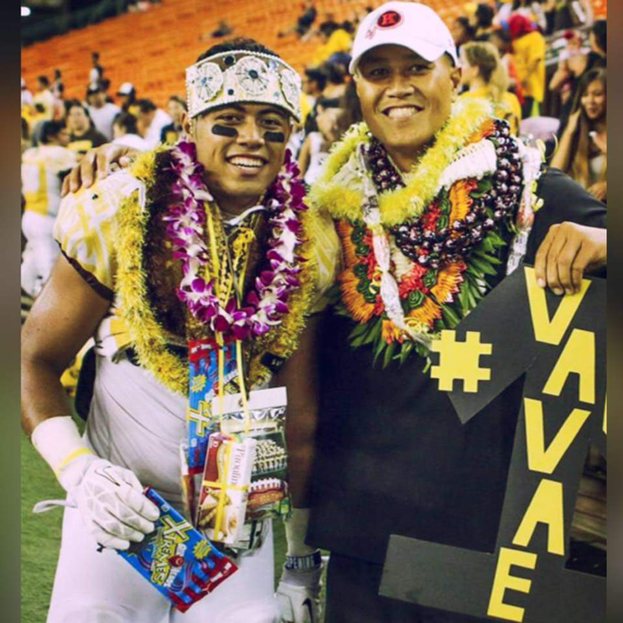 (Photo courtesy of Matthew Capps) Vavae Malepeai (12) and Kahuku Head Coach Vavae Tata after the Oahu Interscholastic Association (OIA) championship game on Oct. 30. Malepeai led the team in rushing yards with a total of 16 carries for 92 yards. 