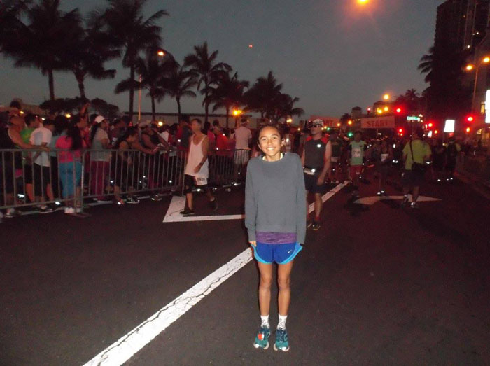 (Photo courtesy of Linda Kawana) After placing ninth in the Great Aloha Run, Vanessa Roybal (12) stayed to watch and support other runners even after she finished. 